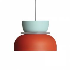 a red and white light hanging from a ceiling fixture with a bowl on the top