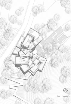 an aerial view of a house surrounded by trees and bushes, with the ground plan drawn out