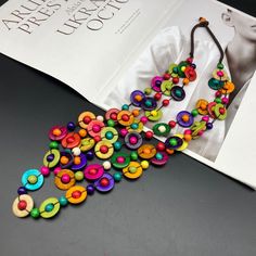 Multicolor Round Beads Flower Necklace For Summer, Bohemian Multicolor Flower Necklace For Summer, Multicolor Flower Necklace For Summer Beach, Trendy Multicolor Summer Flower Necklace, Trendy Multicolor Flower Necklace For Summer, Beaded Multicolor Flower Necklace For Beach, Trendy Multicolor Beaded Flower Necklace, Trendy Multicolor Flower Necklace With Colorful Beads, Beach Multicolor Flower Necklace