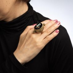 Elaborate vintage large poison or pillbox ring (circa 1950s to 1960s), crafted in 14 karat yellow gold.   Turquoise totals an estimated 0.90 carats & is set upon an onyx mounting that measures 25mm x 17mm. The stones are in excellent condition and free of cracks or crisps.     The ring opens to reveal a secret compartment. Typically this type of ring has been used to carry perfume, locks of hair, devotional relics, messages or other keepsakes.   The substantial ring weighs 35.7 grammes, with a h Pillbox Ring, Poison Ring, Hair Locks, Secret Compartment, Onyx Jewelry, Pill Boxes, Best Wear, Types Of Rings, Ring Vintage