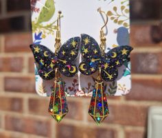 These Beautiful eye catching butterfly earrings are a real statement piece of jewellery  Colourful and shine in all lights  What a wonderful gift or a unique piece to add to any outfit ✨️  Custom colours are available please pop me a message with your requirements ☺️ Party Earrings With Butterfly Charm, Handmade Iridescent Crystal Earrings For Party, Multicolor Butterfly Earrings For Party, Masc Cottagecore, Colourful Earrings, Ethiopian Opal Ring, Beautiful Eye, Plastic Crafts, Earrings Crystal