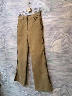 "Baggy Corduroy Pants Corduroy Trousers Boyfriend Pants Brown Sand Corduroy Pants Cowboy style pants Small Size Pants Label size: W32 ; L27 Measurements: (lying flat): Waist: 14\"- 35 cm Hips: 19\"- 48 cm Pant leg inseam: 31,5\" - 80cm Length: 41,5\" - 105 cm Please check measurements to insure a proper fit. Remember to allow yourself some extra room for movement. You can compare these with something from your closet that fits you well. This pants will come to you freshly laundered and ready to Spring Corduroy Straight Pants, Spring Straight Corduroy Pants, Spring Corduroy Pants, Trendy Straight Leg Corduroy Pants, Casual Straight Leg Velvet Pants, Spring Corduroy Full Length Pants, Casual Velvet Straight Leg Pants, Casual Straight Leg Velvet Bottoms, Casual Velvet Straight Leg Bottoms