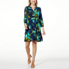 Colleen Lopez Printed Y-neck Dress with Tiered Skirt  This chic tiered dress is an easy popover style. It transitions from season to season with sophistication you'll love. Blue Floral Print Tiered Skirt Dress, Blue Floral Print Tiered Dress, Blue Floral Print Dress With Tiered Skirt, Casual Fitted Blue Tiered Dress, Flowy Floral Print Skirted Dress, Spring Daywear Skirted Dress, Blue Casual Flowy Tiered Dress, Casual Blue Flowy Tiered Dress, Casual Skirted Daywear Dresses