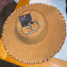 Gorgeous Sun Hat From Old Navy In Excellent Used Condition . Sunhat Fits Like A Small. Sold With A Pair Of Seed Bead Earrings From My Small Shop :) Thanks For Looking! Multicolor Beaded Summer Hat, Beaded Multicolor Summer Hats, Summer Multicolor Beaded Hats, Orange Bohemian Sun Hat, Spring Multicolor Beaded Hats, Multicolor Beaded Beach Hat, Beaded Multicolor Beach Hats, Orange Spring Vacation Jewelry, Brown Summer Beach Jewelry