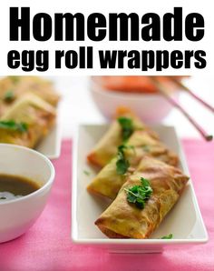 homemade egg roll wrappers on a white plate with dipping sauce and chopsticks