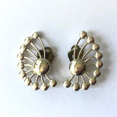 "These adorable vintage clip-on earrings date to the 1960s. These European Mod earrings are in excellent vintage condition and come with their original tag labeled \"Luxor\" Your item will ship in 1-3 business days. International buyers please note: shipping times can vary greatly from country to country and shipping lengths from 3-6 weeks are possible depending on customs, etc of the destination country. 100% customer satisfaction is my goal but please note: the items in my shop are vintage and Clip Earrings Vintage, Retro Pierced Drop Earrings, Vintage Metal Plug Earrings For Formal Occasions, Vintage Plug Earrings For Anniversary, Retro Drop Earrings, Retro Clip-on Earrings For Gift, Nickel-free Retro Earrings For Formal Occasions, Nickel Free Retro Formal Earrings, Nickel Free Retro Earrings For Formal Occasions