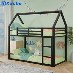 a child's bunk bed with a black frame and green sheets, on top of a wooden floor