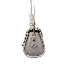 Our Mini Almond Barrel Hand Bag is a small cross-body piece that is truly understated! Its carries a dated vintage tone that takes you on a journey that can be translated to both season-less and glamorous. 100% Genuine Leather Double rotary fasteners Zippered internal compartment Adjustable and Removable shoulder strap Bright gold hardware 8"W x 6"H x 3.5"D. Barrel Bag, Small Crosses, Genuine Leather Bags, Bright Gold, Hand Bag, Gold Hardware, Cross Body, Leather Bag, Barrel