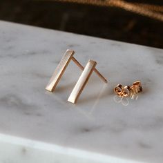 Gold Bar Earrings 14k Yellow Gold Earrings 14k by ShopClementine Minimalist 14k Rose Gold Linear Earrings, Modern 14k Gold Everyday Linear Earrings, Minimalist Yellow Gold Earrings, Minimalist Yellow Gold Linear Earrings, Minimalist Rose Gold Linear Earrings For Gift, Minimalist Rose Gold Linear Earrings Gift, Matte Gold Minimalist Earrings For Everyday, Art Deco Inspired Jewelry, Antique Style Jewelry