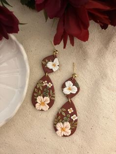 Polymer Clay Lightweight earrings with stainless steel findings, boho fall floral design. Clay Idea, Polymer Clay Flower Jewelry, Handmade Clay Jewelry, Clay Flower, Fall Earrings, Polymer Clay Flowers, Boho Fall, Clay Flowers, Burgundy Floral