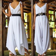 "White Boho Jumpsuit, Maxi Bohemian Jumpsuit, Kundalini Yoga Jumpsuit Introducing the ultimate summer jumpsuit, made from 100% natural cotton fabric. This gorgeous piece is not only beautiful but also incredibly breathable, perfect for the warmer months. Sizing: Made in one size to fit XS to XXL / US: 2/4/6/8/10/12/14/16/18/20 This jumpsuit would fit persons up to 5'8\". If you don't have a long torso it would fit up to 6'. We can alter the length for free, just send a message before your purcha Bohemian Beach Jumpsuits And Rompers, Bohemian Style Beach Jumpsuits And Rompers, Bohemian Beach Overalls And Rompers, Bohemian Beach Jumpsuits, White Backless Jumpsuit For Summer, White One-piece Jumpsuits And Rompers For Summer, White One-piece Jumpsuit For Summer, White One-piece Summer Jumpsuit, White Sleeveless Jumpsuit For The Beach