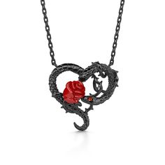 What a cool necklace! If you are looking for a unique snake necklace, this masterpiece will be a nice choice. This dramatic pendant attracts eyes with its charming red eyes and a delicate rose flower entwining gracefully around its body. Made from sterling silver plated black and stones, very dazzling, unique particularly attractive, it is suitable to wear for Halloween to highlight your personality.Carat Weight: 0.009 ctStone Size: 1 mmStone Type: Jeulia® StoneNumber of Stones: 1 Stone Shape: R Red Snake-shaped Jewelry For Gifts, Valentine's Day Heart Pendant Necklace With Rose Design, Gothic Necklace With Adjustable Chain For Valentine's Day, Gothic Rose Jewelry For Gift, Gothic Rose Colored Jewelry For Gift, Rose-colored Gothic Jewelry For Gift, Gothic Rose-colored Jewelry For Gifts, Movie Jewelry, Interesting Gifts