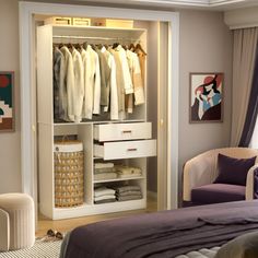 a bedroom with a bed, chair and closet full of clothes on it's shelves