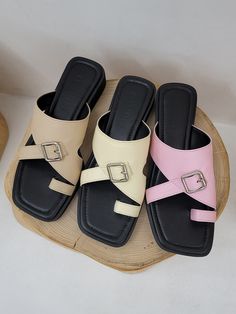 Editor's NotesKERRIJADE's uniquely designed buckle accent slide/sandals are comfortable and stylish. - Open square toe- Sponge midsole- Buckle detail on the vamp- Toe-ring- Vamp holds most of your instep for comfort - Wide cushioned outsoleMeasurements(in.)- Size: KR 225 MM - KR 255 MM- Heel height: 1.18 in- Fits true to size. Composition & Care- Upper: Lambskin - Lining: Pigskin- Avoid direct heat and moisture- Do not wash- Avoid fire- Dry with a dry cloth when wet- Avoi Summer Square Toe Mules With Buckle Closure, Beige Open Toe Sandals With Tang Buckle, Spring Open Toe Toe Ring Sandals With Buckle Closure, Chic Summer Mules With Tang Buckle, Toe Loop Sandals With Tang Buckle For Summer, Summer Sandals With Single Toe Strap And Tang Buckle, Summer Toe Loop Sandals With Tang Buckle, Spring Square Toe Mules With Buckle Closure, Chic Summer Slides With Tang Buckle