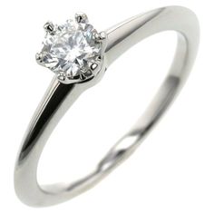 TIFFANY & Co. Platinum .37ct Diamond Engagement Ring 5.5 Metal: Platinum Size: 5.5 Diamond: Round brilliant diamond, carat total weight .37ct, H color, VS1 clarity Hallmark: ©TIFFANY&Co. Pt950 69413552 D0.37ct Condition: Excellent condition, like new, comes with Tiffany box and certificate Similar rings currently retail for $3,600 to $3,900 in Tiffany stores Authenticity guaranteed Tiffany Box, Tiffany And Co, American Diamond, Brilliant Diamond, Jewelry Rings Engagement, Diamond Engagement Ring, Tiffany & Co., Round Brilliant, Ring Verlobung