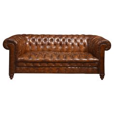 a brown leather couch on a white background