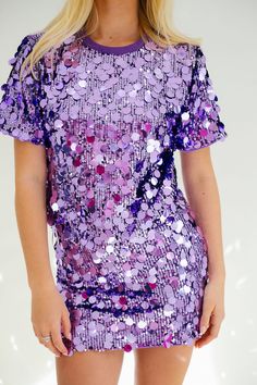 Unleash your wild side with the PURPLE PASSION SEQUIN TOP! This bold t-shirt features dazzling sequins in a vibrant purple hue. The round ribbed neck and short sleeves add a touch of casual charm to this otherwise show-stopping piece. Get ready to turn heads and make a statement with this unique top. Product ships within 7-10 days. Orders containing custom items ship within 14 business days. Sparkly Clothes, Sparkly Outfits, Tshirt Oversized, Unique Top, Shimmer And Shine, Vibrant Purple, Shimmer N Shine, Purple Shirt, Purple Hues