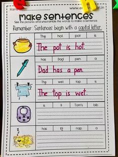 the worksheet for making sentences is hanging on a bulletin board with markers