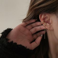 Everyday delicate ear jewelry set, enjoy the fun of mix and match. Dainty gold lace layering cuff earrings and cuff threader. Exquisite sparkly cz embedded layering with gold cuff, matches perfectly with dangling cuff threader. The threader is very versatile, can be wear in 2 ways, both stunning as either pierced or non pierced earrings. Go as you please, be you, be stylish everyday. 💎 Features: ♥ Finish Tone: 14K gold plated ♥ Side Stone: Cz crystal ♥ Ear cuff + Cuff threader Set ♥ Non-pierced Dainty Single Cartilage Earring For Party, Trendy Ear Climbers As A Gift, Trendy Pierced Dangle Ear Cuff, Dainty Single Ear Climber For Parties, Dainty Single Ear Cuff For Party, Trendy Dangle Ear Climbers As Gift, Dainty Ear Climbers For Parties, Dainty Ear Climbers For Party, Gold Cartilage Earrings With Adjustable Chain