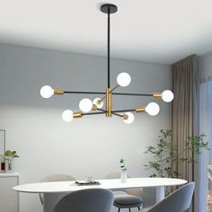 a dining room table with chairs and a chandelier hanging from it's ceiling