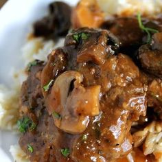 a close up of food on a plate with rice