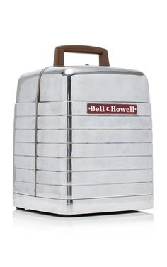 a silver toaster with the word bell and hovel on it's side