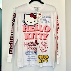 *New Rare* Zara Hello Kitty Japan Graphic Long Sleeve Tee Small New With Tags Size Small Measures 19” X 26” You Can Never Have Enough Red Or Ribbons In Your Life Front, Sleeve And Back Graphics Hello Kitty Crew Neck Top, Fitted Hello Kitty Crew Neck Top, Hello Kitty Print Crew Neck Top For Streetwear, Spring White Hello Kitty Top, Zara Long Sleeve Tops With Graphic Print, Fitted Long Sleeve Top With Cartoon Print, Hello Kitty Long Sleeve Cotton Top, Hello Kitty Print Graphic Tee For Spring, White Hello Kitty Print Top For Streetwear