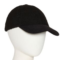 a white mannequin head wearing a black hat