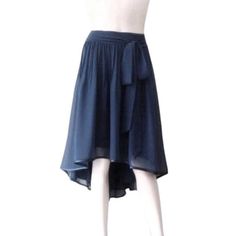 "It is made from good quality Chiffon fabric. This is custom-made in your measurements. Skirt length: front 22, back 30\" .It can be made longer or shorter. It is made with a zipper. You can choose other colors from the color chart. When you order please give me your measurements: 1: The length of the skirt from the top of the waistline to the bottom hem. 2: Waist ( where you want the waistline to be). 3: Hips ( around the fullest part) 4: And your color choice. *Note: The colors may show a litt Blue Flared Chiffon Skirt, Blue Flowy Party Skirt, Flowy Blue Party Skirt, Blue Flowy Skirt For Party, Blue Chiffon Lined Skirt, Chiffon Asymmetrical Skirt With Lining, Party Pleated Chiffon Skirt, Chiffon Pleated Party Skirt, Party Fitted Pleated Chiffon Skirt