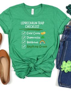 a green t - shirt with the words leprechaun trap checklist on it