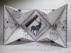 an origami card with a deer on it