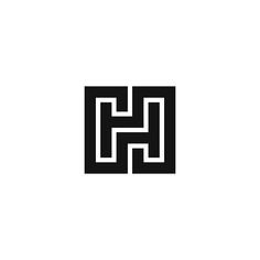 the letter h is made up of black and white squares, which appear to be intertwined