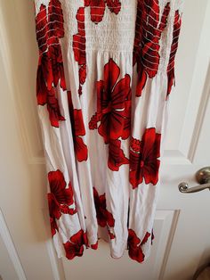 Vintage Ladies Black, Red and Whihte Flower Hawaiian Sun Dress.. very Tropical looking. 100 % rayon. In good vintage condition.. Clean.. no issues. ..I would say it is like a size medium but it has elastic stretch on the bodice area. Red Rayon Dress For Vacation, Red Rayon Beach Dress, Red Hawaiian Beach Dress, Red Sleeveless Rayon Maxi Dress, Casual Red Floral Print Sundress, Casual White Hibiscus Print Dress, Casual Red Floral Print Maxi Dress, Sleeveless Red Rayon Maxi Dress, Red Hawaiian Dress With Floral Print