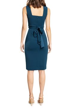 Flattering and sophisticated, this midi-length crepe dress features a figure-skimming silhouette, alluring side slits and a tie that wraps around the waist. 42 1/2" length Hidden back-zip closure V-neck Sleeveless Get the perfect fit—book an appointment with one of our alterations experts Lined 96% polyester, 4% spandex Hand wash, dry flat Imported Women's Clothing Sleek Work Dresses With Side Slits, Sleek Workwear Dresses With Side Slits, Formal Midi Dress With Flattering Cut, Chic Fitted Midi Dress With Side Slits, Sleek Midi Dress With Side Slits For Work, Flattering Midi Length Elastane Dress, Belted Knee-length Evening Dress, Knee-length Dresses With Side Slits For Date Night, Elegant Midi Dress With Side Slits For Work