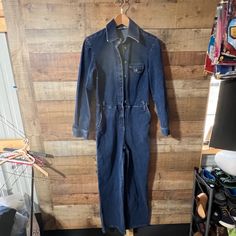 Elevate your summer wardrobe with this vintage Newport News Jeanology one-piece pant romper overall. Designed for women's regular size 6, this blue denim romper features a stylish and comfortable design, perfect for any occasion. Shoulder to crotch measures apx. 28", waist flat across the front measures apx. 14" and the inseam measures apx. 29".  So cute and in overall great vintage condition.  Follow us on Instagram wearing this beauty @handmeupresale Vintage Cotton Denim Jumpsuit In Medium Wash, Retro Dark Wash Denim Jumpsuit, Vintage Denim Jumpsuit For Work, Retro Dark Wash Cotton Denim Jumpsuit, Vintage Denim Blue Jumpsuit For Spring, Vintage Cotton Denim Jumpsuit, Vintage Dark Wash Cotton Denim Jumpsuit, Vintage Denim Blue Cotton Jumpsuit, Blue Vintage Jumpsuits And Rompers