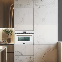 a kitchen with marbled walls and white appliances in the corner, along with a plant