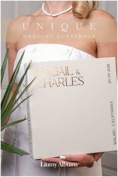 a woman in a white dress holding a book with the title unique wedding guest book