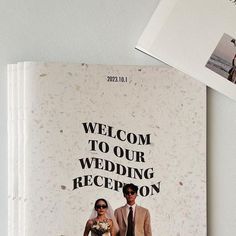 a wedding program is displayed on a table with an image of the bride and groom