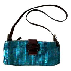 Rare Fendi Sequin Blue Baguette Condition - Good Very Beautiful Piece That Has Been Taken Care Of Color - Blue Sequins, Brown Leather Material - Sequins, Beads, Stain Interior, Leather Strap & Buckle Magnetic Closure, Zipper Closure, Interior Zip Pocket Fendi Bags, Leather Material, Magnetic Closure, Leather Straps, Brown Leather, Zip Pockets, Sequin, Fendi, Color Blue