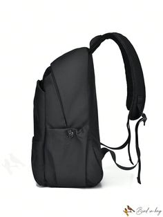 a black backpack sitting on top of a white surface