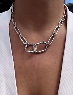 An edgy and modern, oval link chunky chain necklace with a front-facing double carabiner clasp. This is a great piece for making a statement in a minimalist style.  ▪️Oval link chain, silver plated zamak  ▪️Carabiner clasps, silver plated zamak ▪️Fastens at front ▪️The necklace will be presented in attractive Scraffs packaging  ++ Check out our Etsy shop for lots of other fabulous jewellery and accessories www.etsy.com/shop/scraffs ++ Elegant Chain Link Necklaces With Carabiner Clasp, Trendy Paperclip Chain Jewelry, Silver Metal Necklace With Carabiner Clasp, Modern Link Necklaces With Hook And Links, Silver Necklace With Carabiner Clasp In Metal, Link Necklaces With Carabiner Clasp, Chic Paperclip Chain Necklace With Chunky Chain, Modern Chain Necklace With Lobster Clasp For Everyday, Modern Everyday Chain Necklace With Lobster Clasp