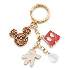 Add a touch of flair to your bag or backpack with our Mickey Mouse Icons Bag Charm. Designed to elevate your accessory game, this stylish charm features quintessentially Mickey Mouse elements that add a playful touch to any bag, making it the perfect accessory to express your unique sense of style. Vera Bradley Disney Mickey Mouse Icons Bag Charm Keychain Brown/Black Vera Bradley Disney, Mouse Icon, Hinged Ring, Mickey Mouse Head, Backpack Lunch Bag, Duffel Bag Backpack, Disney Addict, Charm Keychain, Stocking Stuffer Gifts