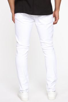 Available In White Button Closure Zip Fly 5 Pocket Body Knee Distressing With Backing 31 Inseam 98% Cotton, 2% Spandex Imported Model Height: 6'2" Model is wearing size 34"  | Mens Reel It In Skinny Jean in White size 38 by Fashion Nova Classic White Stretch Jeans, White Classic Slim Fit Jeans, Classic White Slim Fit Jeans, Slim Fit White Cotton Bottoms, White Slim Fit Cotton Bottoms, White Cotton Slim Fit Bottoms, Fitted White Cotton Jeans, White Fitted Cotton Jeans, Casual White Jeans With Button Closure