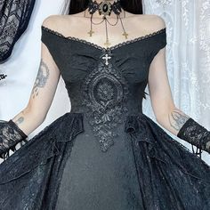 Step into the shadows of style with our Women's Gothic Off-the-Shoulder Lace Splice Halloween Dress, meticulously designed to captivate and enchant. This dress is a masterpiece of intricate details and haunting beauty, perfect for those who dare to stand out. 
 
The patchwork design on the waist features ruffled lace that adds depth and texture to the dress. Each lace splice is carefully placed to enhance the silhouette and create a sense of mysterious allure. 
 
The off-the-shoulder design acce Haunting Beauty, Crosses Decor, Metal Cross, Lace Splicing, Lace Neckline, The Shadows, Patchwork Designs, Halloween Dress, Floral Embroidery