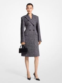 Softly structured and meticulously tailored in Italy, this herringbone tweed coat features lightly padded shoulders, a double-breasted closure and a carved-out waistline for feminine definition. An ideal outer layer for work and evening alike, it looks smart teamed with a timeless top-handle bag and pointed-toe pumps, as seen on our Fall/Winter 2024 runway. Luxury Winter Tweed Dress For Formal Occasions, Luxury Tweed Dress For Winter Formal, Luxury Tweed Dress For Formal Winter Occasions, Luxury Tweed Dress For Formal Winter Events, Fitted Tweed Wool Coat For Work, Luxury Tweed Dress For Workwear In Fall, Elegant Fitted Tweed Wool Coat, Designer Fitted Tweed Outerwear, Formal Wool Tweed Dress For Fall