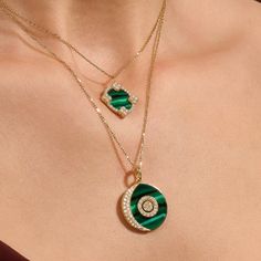 Discover lunar elegance with our Green Enamel Moon and Orbit Necklace, a celestial symphony of elegance and style. This enchanting piece features a fine gold chain adorned with a mesmerizing moon and orbit pendant on vivid green enamel. Inspired by the cosmos, this necklace captures the magic of the night sky, making it a celestial and elegant addition to your jewelry collection. - Made in 14k solid gold - Decorated with handset white cubic zirconia stone - Finished with Green Enamel - Pendant d Elegant Moon Phase Pendant Jewelry, Elegant Diamond Moon Phase Jewelry, Elegant Diamond Necklace With Moon Phase Detail, Elegant Diamond Necklace With Moon Phase, Elegant Jewelry With Moon Shape And Adjustable Chain, Elegant Jewelry With Adjustable Chain And Moon Shape, Elegant Moon Shaped Jewelry With Adjustable Chain, Elegant Moon-shaped Jewelry With Adjustable Chain, Elegant Gold Jewelry With Moon Phase Detail