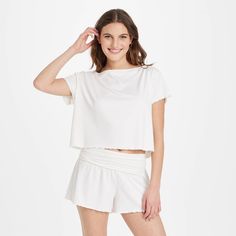 Get ready for bed in charming style with this Short-Sleeve Top and Shorts Pajama Set from Colsie™. This two-piece pull-on pajama set includes a short-sleeve top and pajama shorts, both featuring allover lettuce trim for pretty flair. The pajama set is crafted from soft, stretchy fabric to keep you moving through the day in absolute comfort, while a full elastic waistband on the shorts provides a snug fit. You can wear the pieces together or mix and match with other sleepwear for a variety of com Comfortable Summer Pajama Shorts For Sleep, Comfortable Summer Sleep Pajama Shorts, Comfortable Pajama Shorts For Spring Pajama Party, Comfortable Spring Pajama Shorts For Pajama Party, Comfortable Summer Pajama Shorts For Bedtime, Comfortable Stretch Summer Sleepwear, Comfortable Stretch Sleepwear For Summer, Casual Solid Sleepwear For Spring, Casual Pajama Shorts For Spring Bedtime