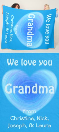 two children laying in bed under a blue blanket with the words grandma and grandpa printed on it