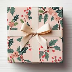 a present wrapped in pink and green wrapping paper