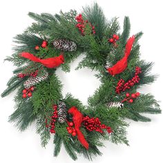 a christmas wreath with pine cones, red berries and evergreen needles on a white background